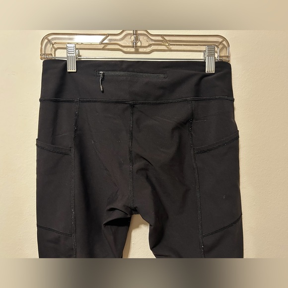 Lululemon Black Leggings with Scalloped Hem and dot accents size 8 - Picture 6 of 7